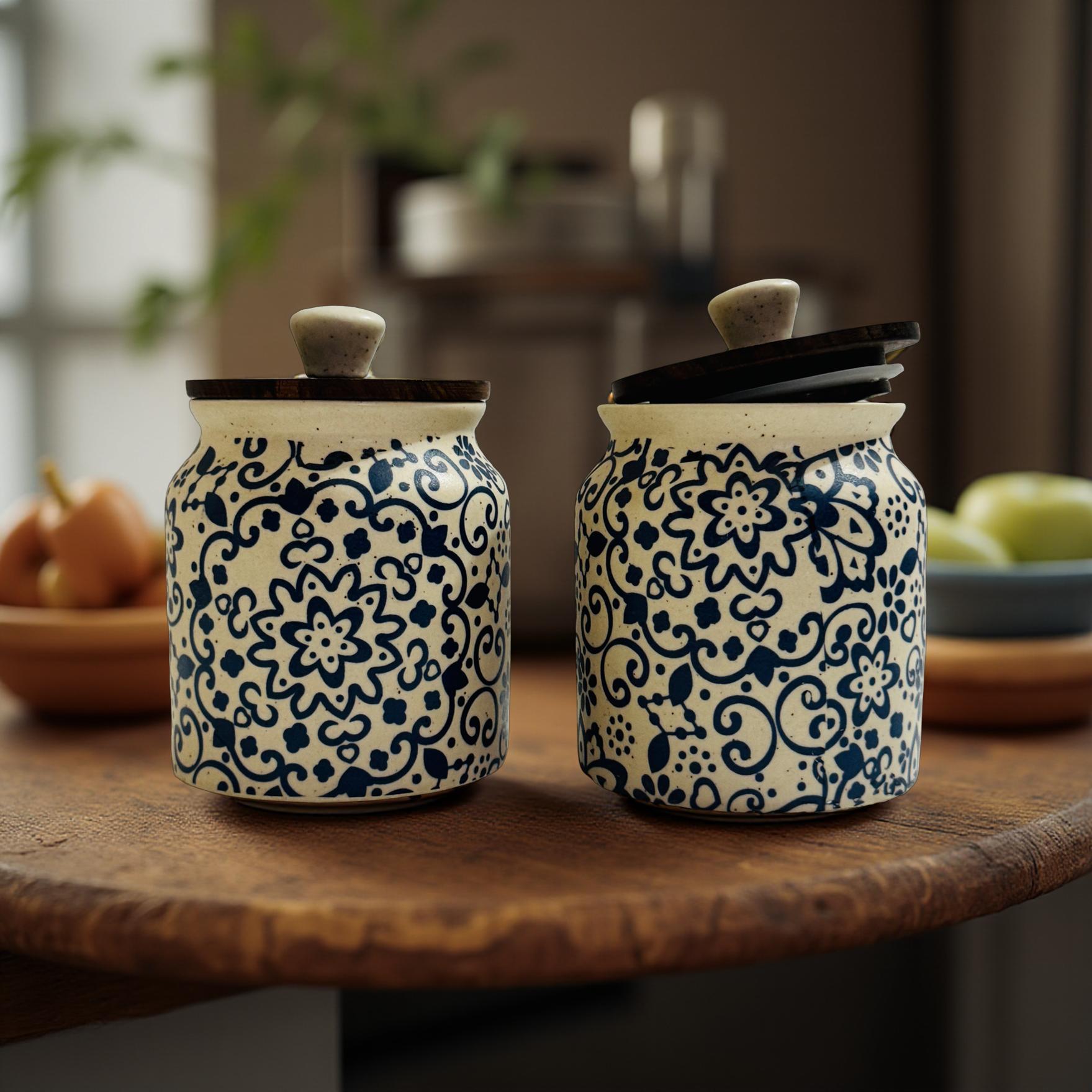 Handpainted Ceramic Jars Sitting on a Sleek Wooden Platform