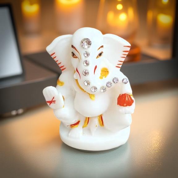 Decorative elephant figurine with gemstones on a blurred background
