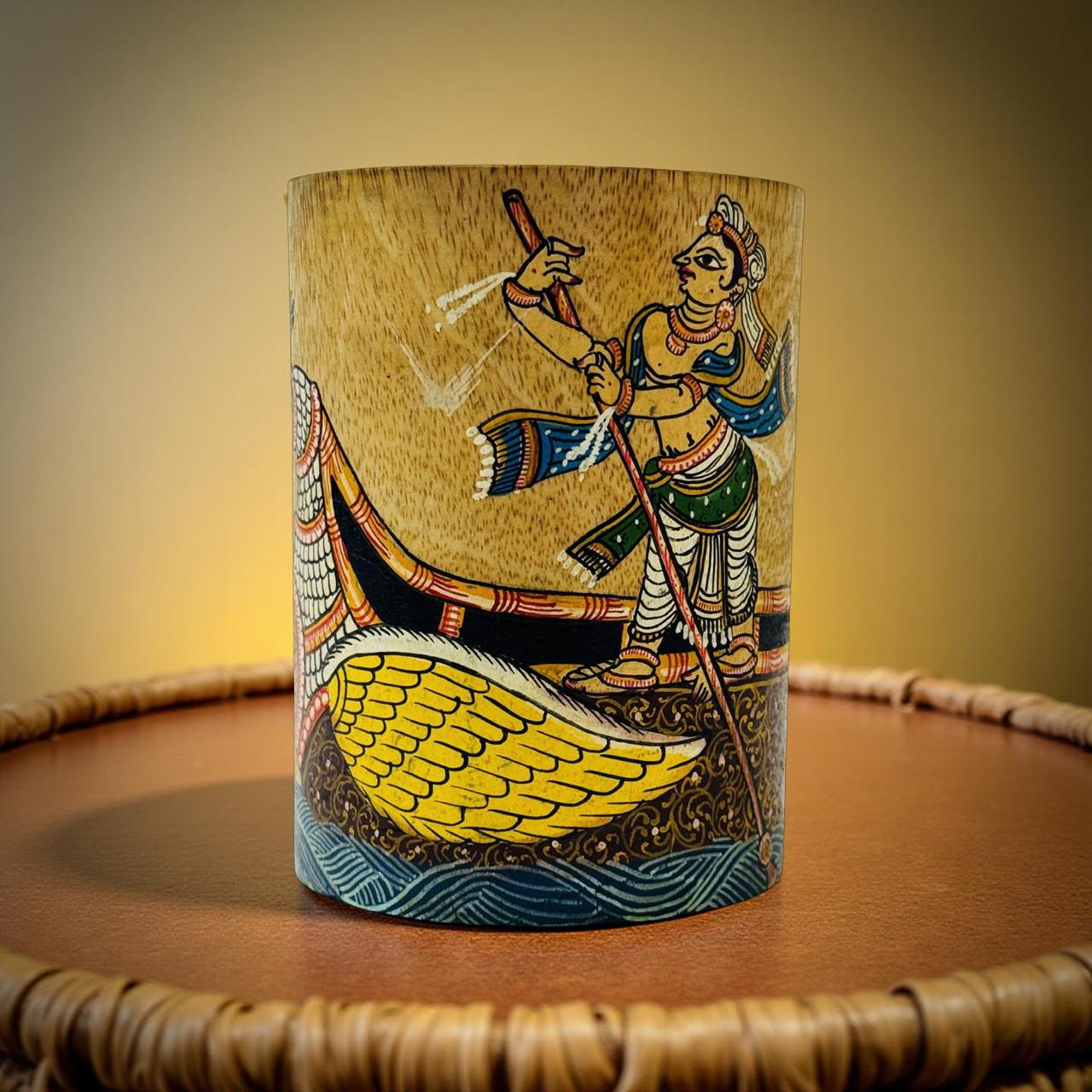 Handpainted wooden holder with colorful Pattachitra boatman artwork – ideal for art-loving youth and creative workspaces