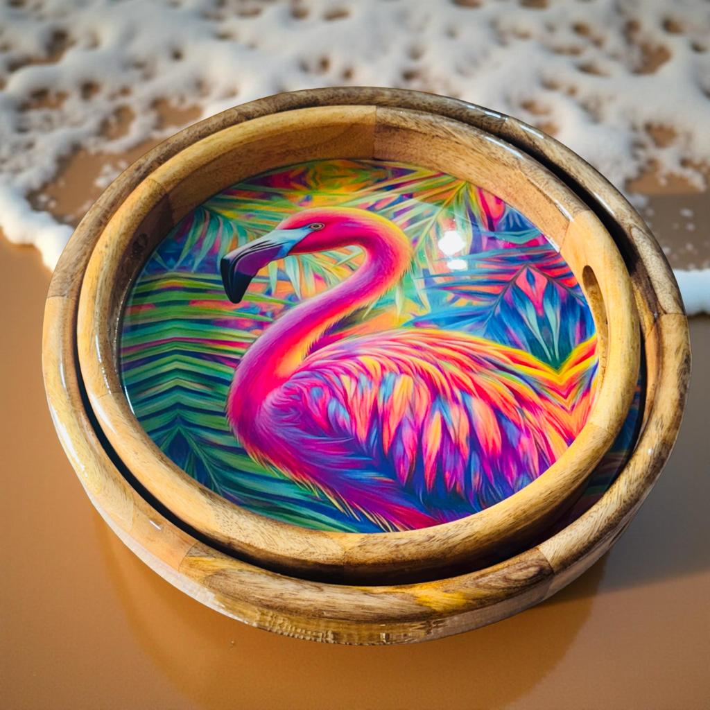wooden tray with printed flamingo design kept on a polished surface