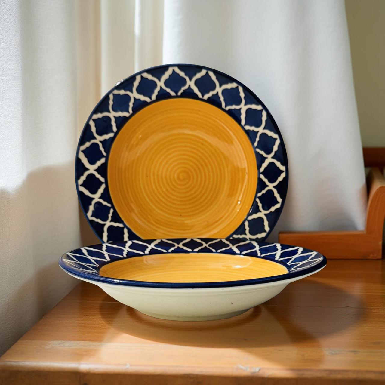 Yellow plate with blue decorative rim on a wooden surface
