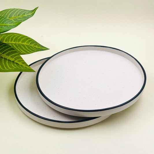 Minimalist set of 2 ceramic flat plates in Japandi style with clean lines