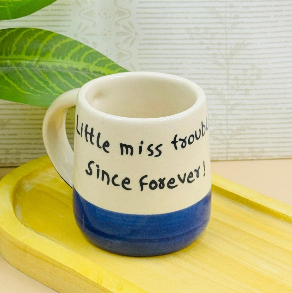 White ceramic mug with black text: "Little Miss Trouble Since Forever" – funny quote mug, 250 ml