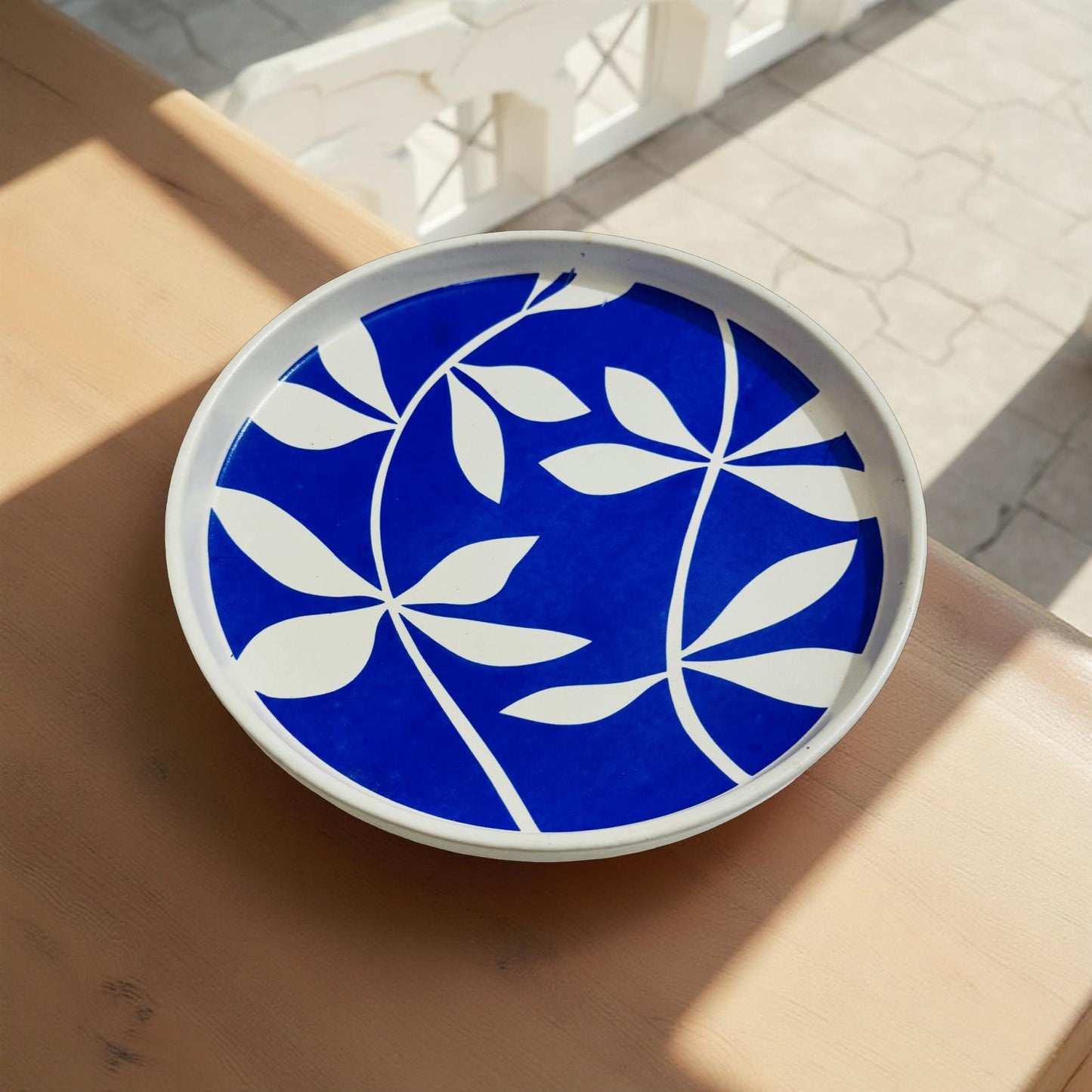 white and blue ceramic plates for food photography