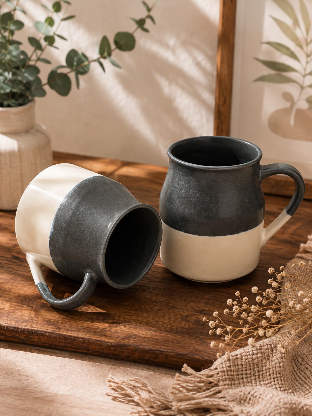 Set of 2 black and ivory ceramic mugs for coffee, tea and hot chocolate