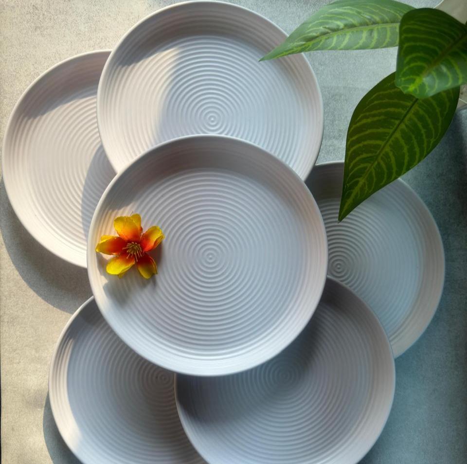 Round beige melamine side plates with modern ribbed texture, set of 6