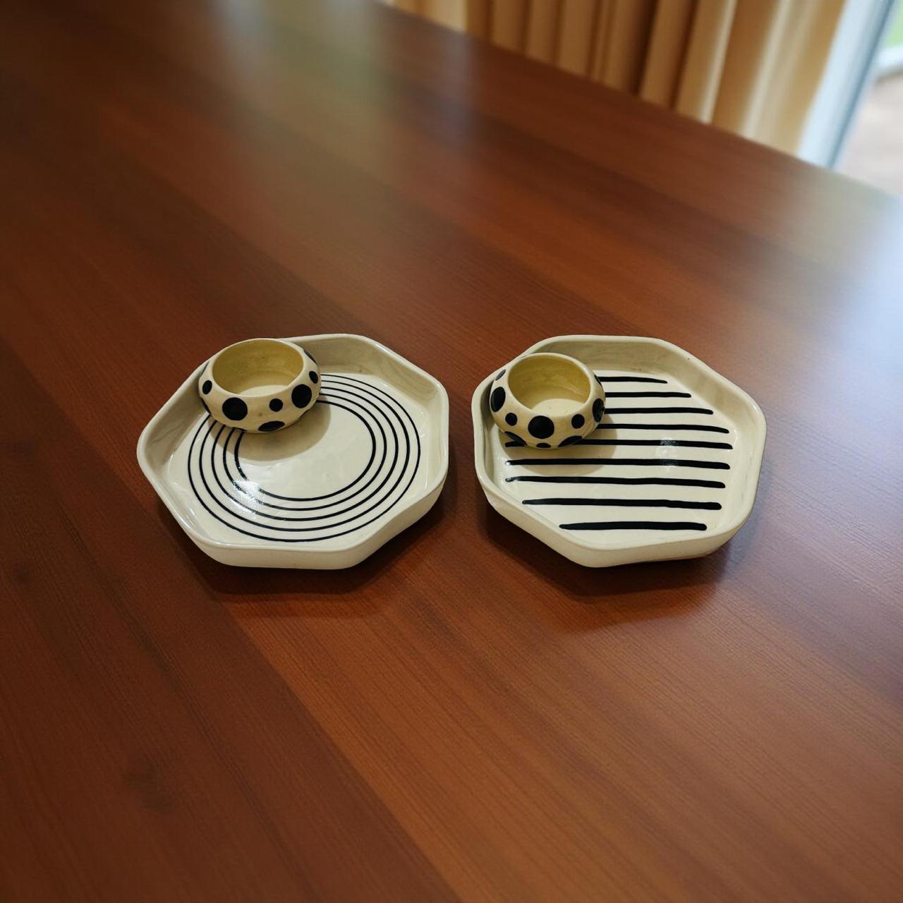 two ceramic plates each with chutney bowls are placed beautifully on a walnut finish wooden platform 