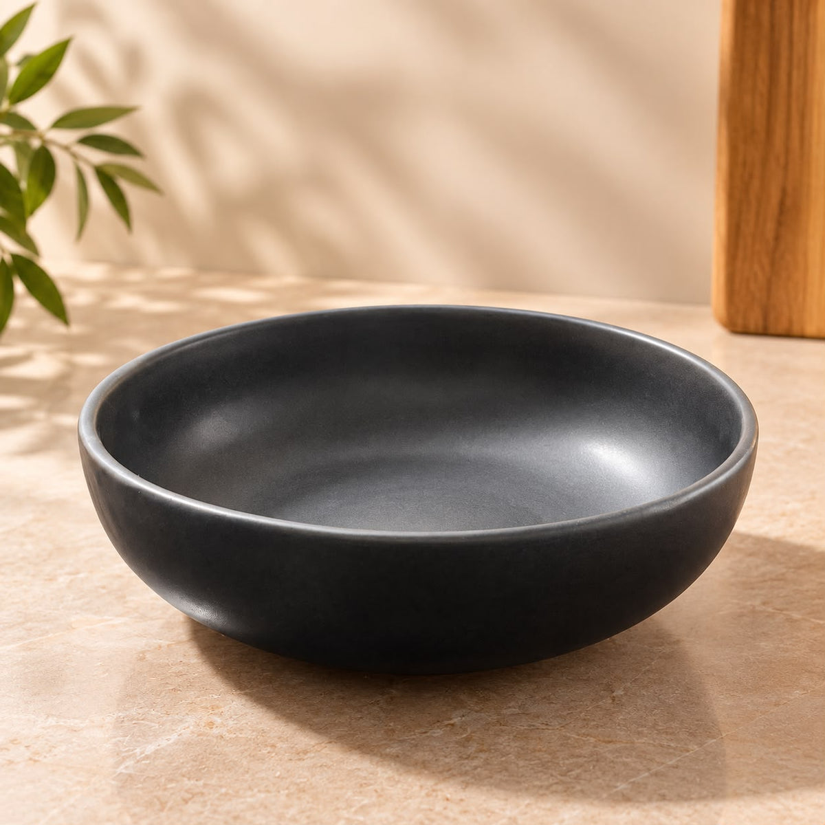 Whether used for serving or displayed as part of your interiors, this black ceramic bowl adds personality to your home while remaining practical for everyday occasions.