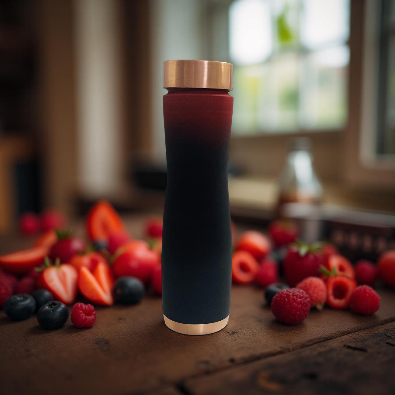 Black and gold thermos bottle on a wooden surface with fruits in the background