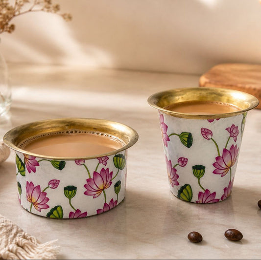 Floral brass dabra set with filter coffee served on aesthetic beige background