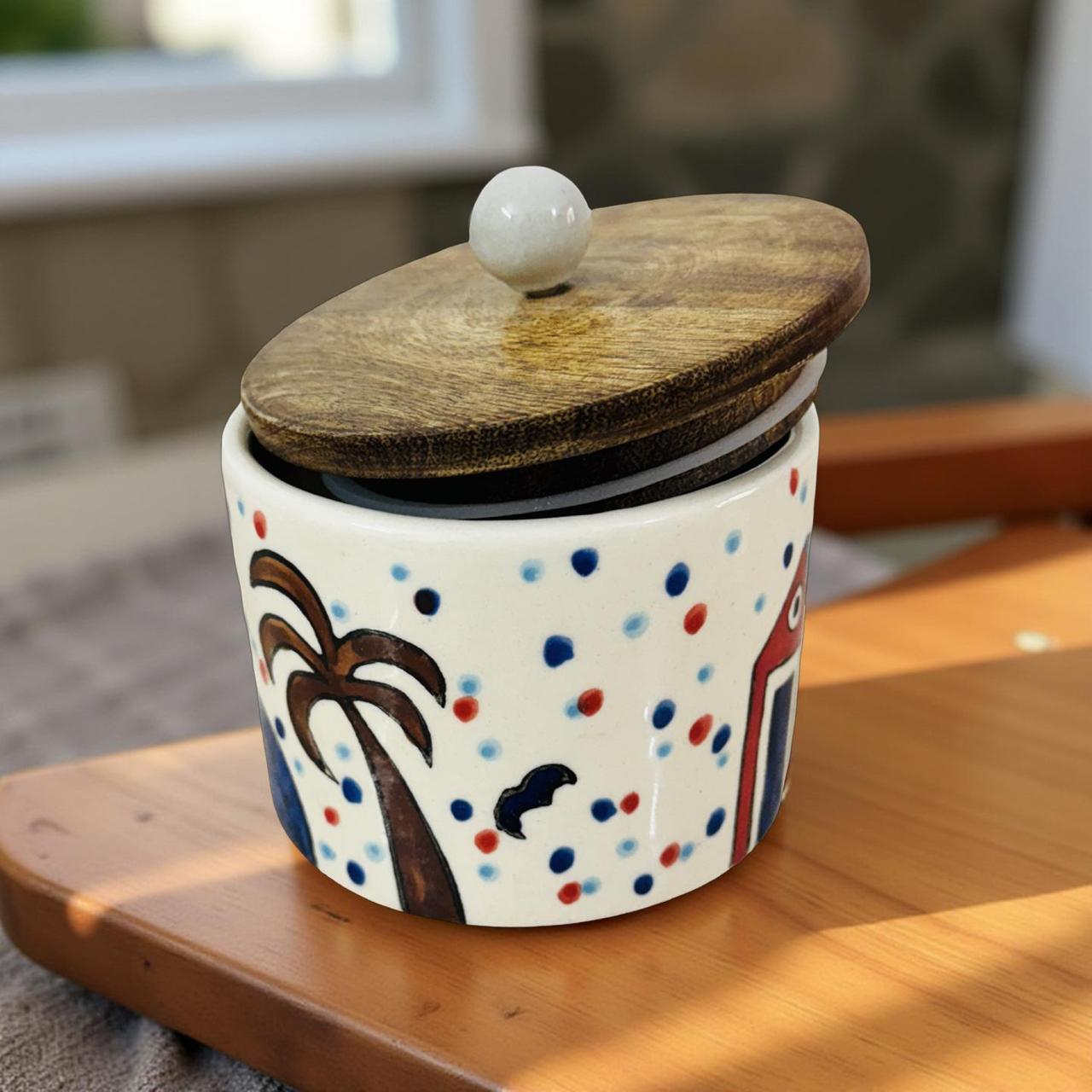 Ceramic container with wooden lid on a wooden surface