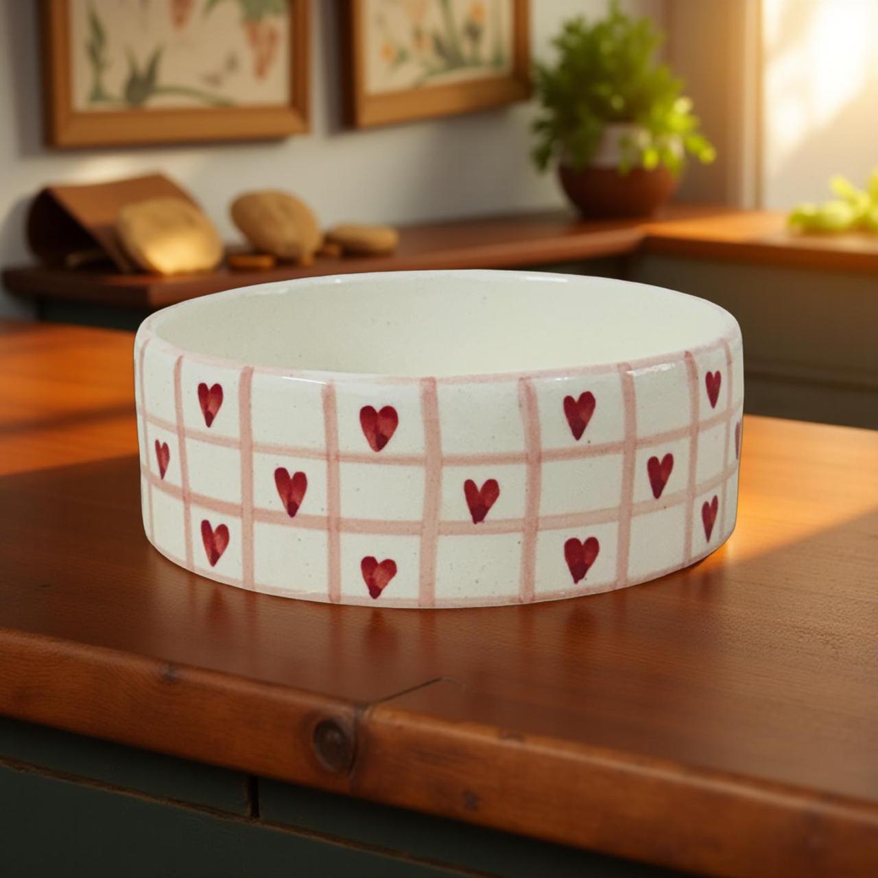 checkered ceramic heart bowl  on a wooden surface in a kitchen tabletop