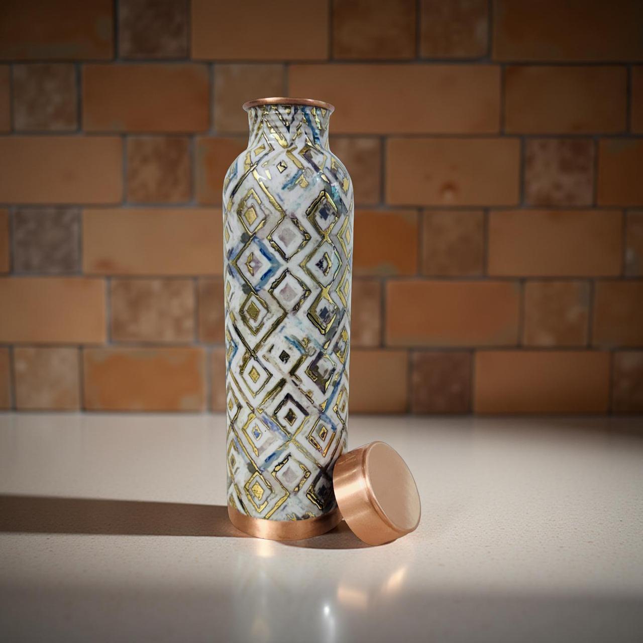 Decorative ceramic bottle with geometric pattern against a brick wall.
