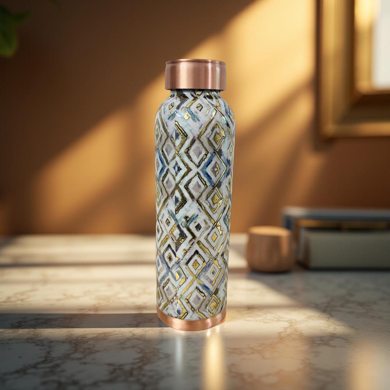 Decorative water bottle with geometric pattern on a marble surface