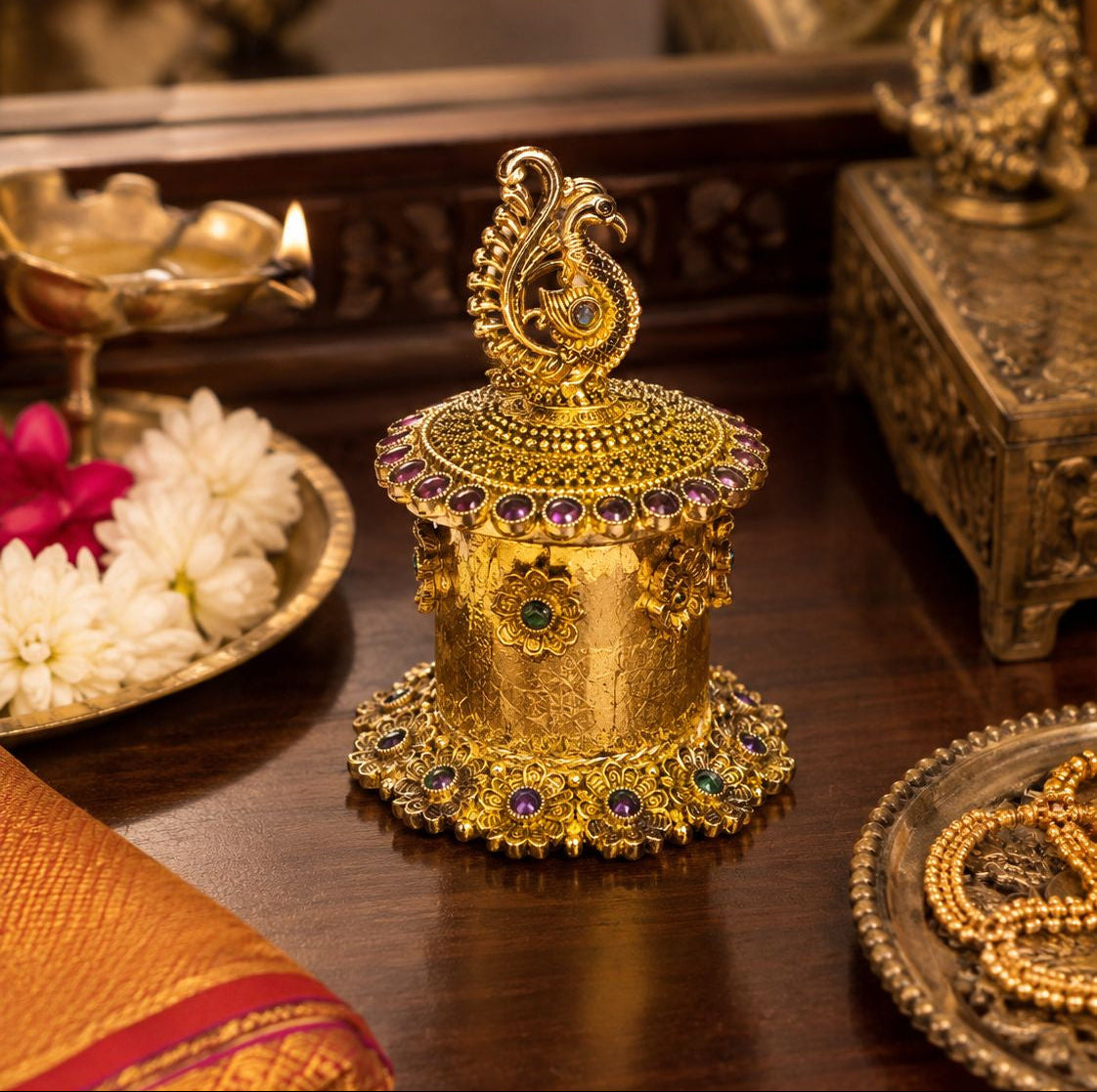 Premium handcrafted brass kumkum box with intricate peacock motif and royal gemstone detailing