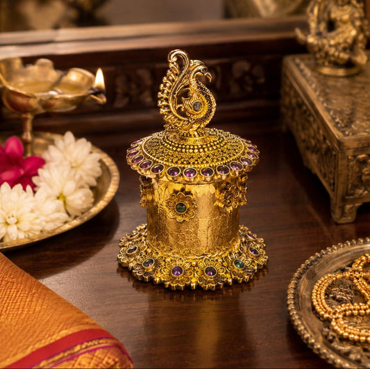 Premium handcrafted brass kumkum box with intricate peacock motif and royal gemstone detailing