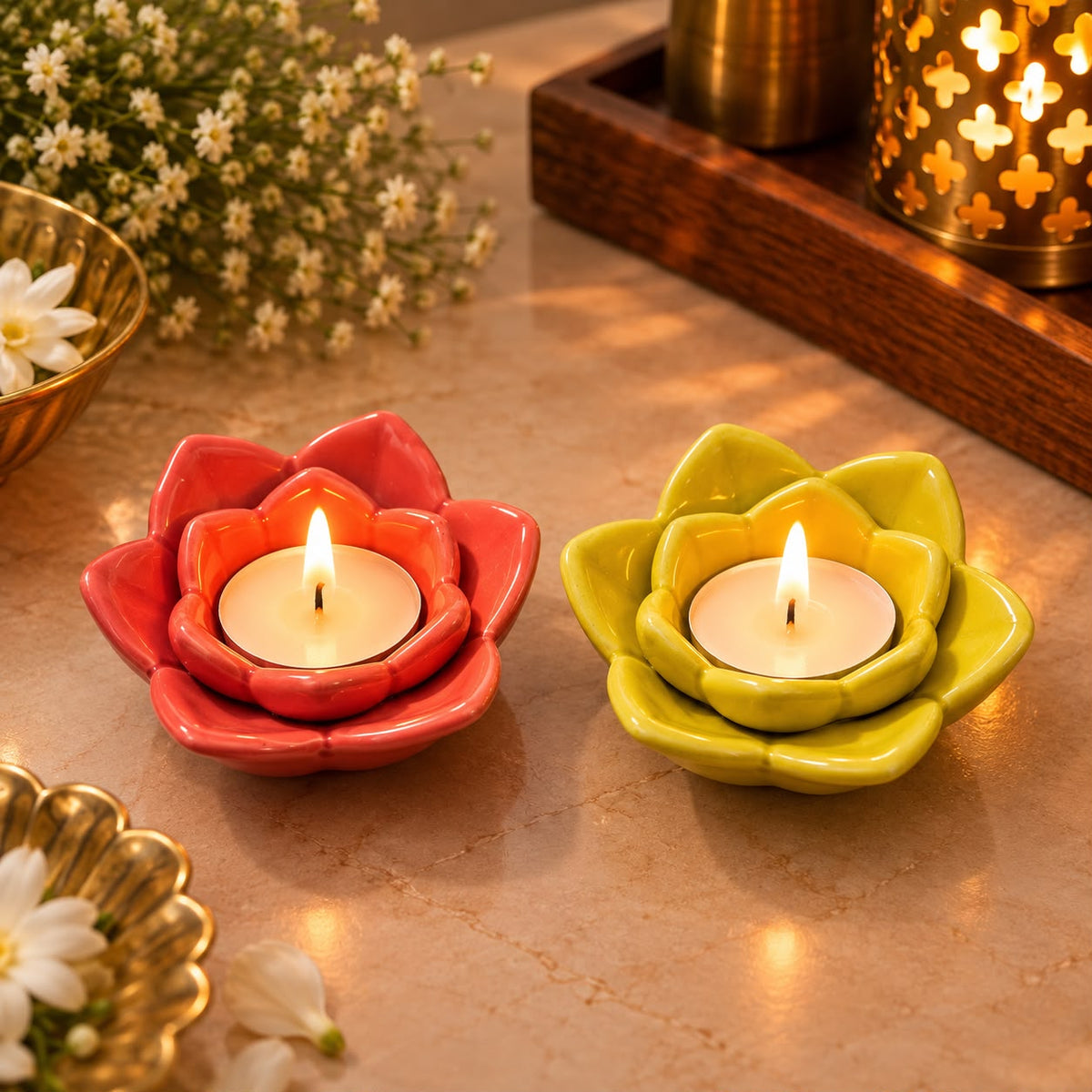 Red and yellow lotus flower candle stands for festive decoration