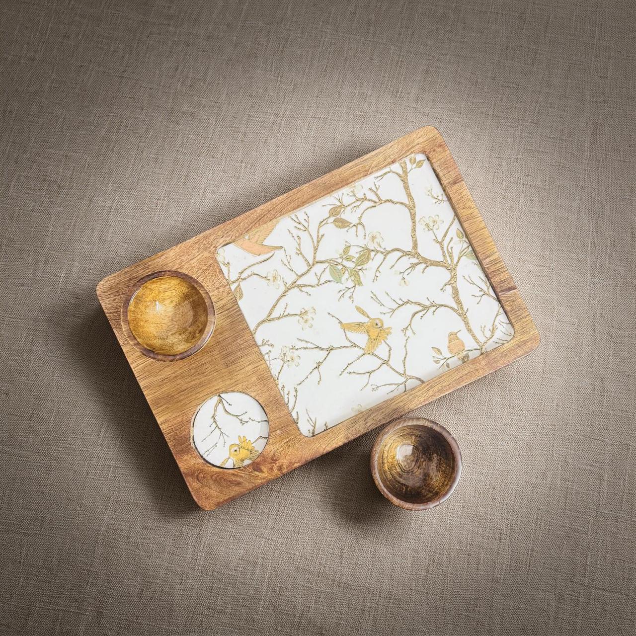 Wooden tray with decorative items on a textured surface
