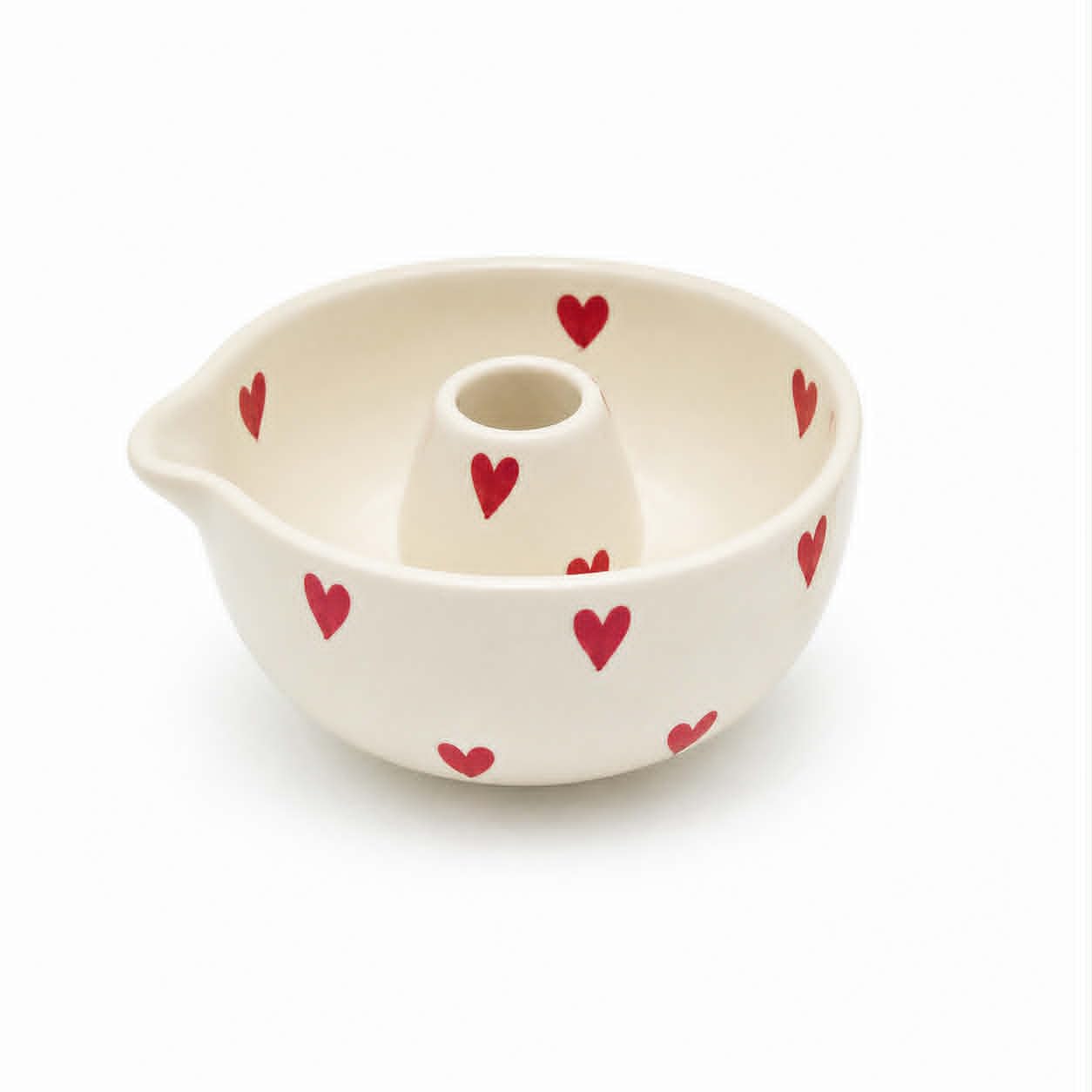 Ceramic bowl with heart patterns on a white background