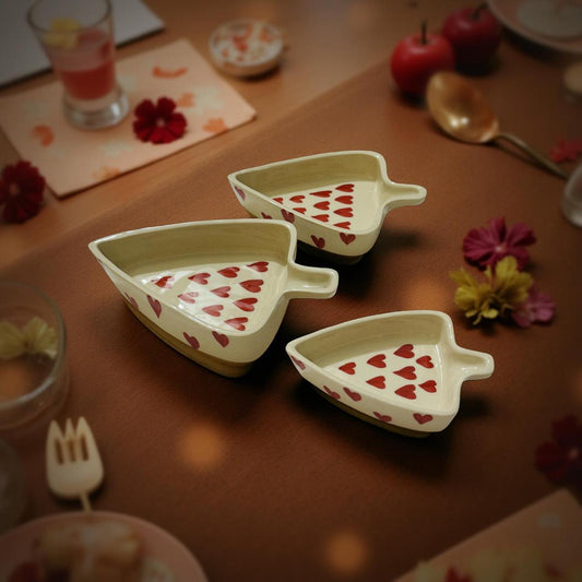 ceramic leaf shaped  heart motif bowls placed on a beautiful table set up 