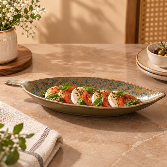 Leaf shaped ceramic serving platter for snacks and dry fruits