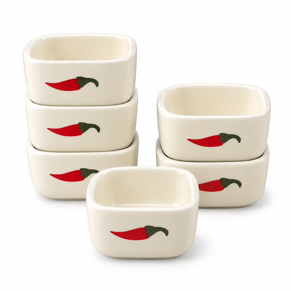 Square condiment bowls arranged for Indian meal serving