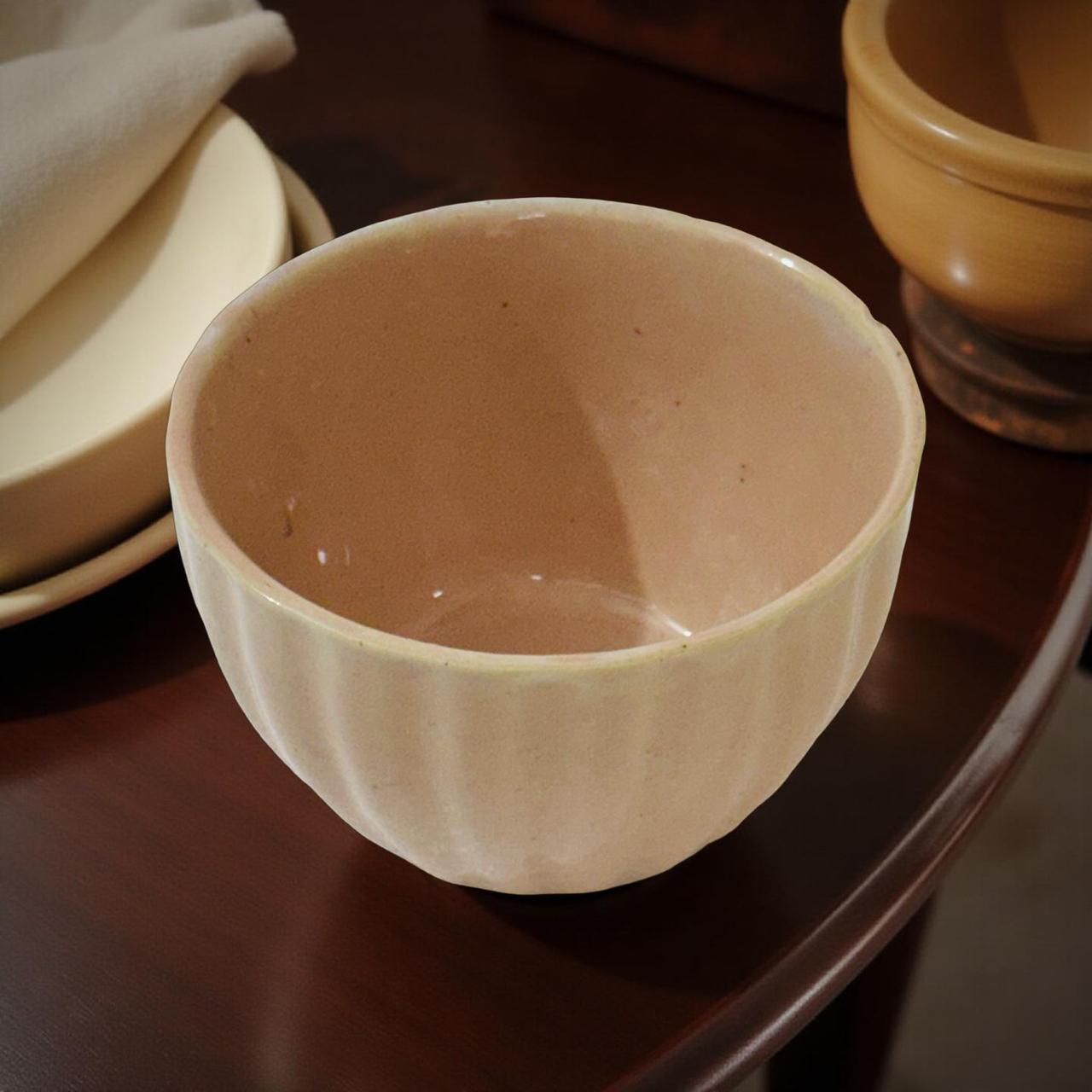 Ceramic bowl on a dark surface