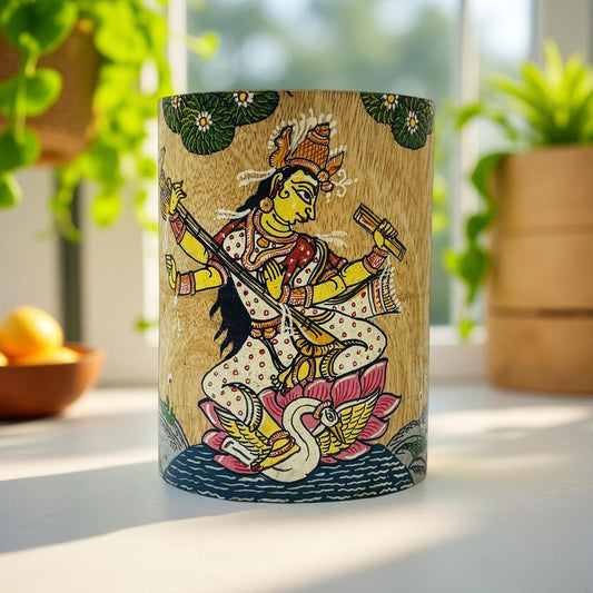 Handpainted wooden holder featuring Goddess Saraswati in Pattachitra art – ideal for Indian home decor and divine utility