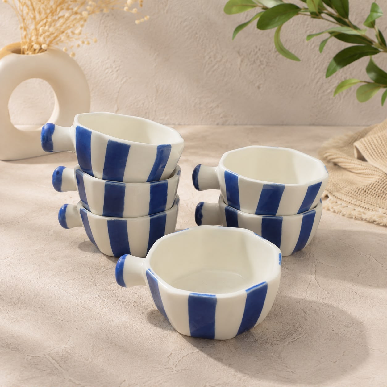 Modern ceramic kitchen bowls with blue stripe design for everyday serving
