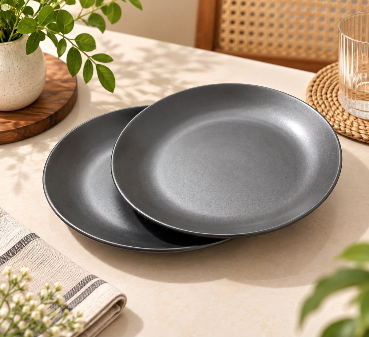 Charcoal black stoneware plates for stylish food presentation