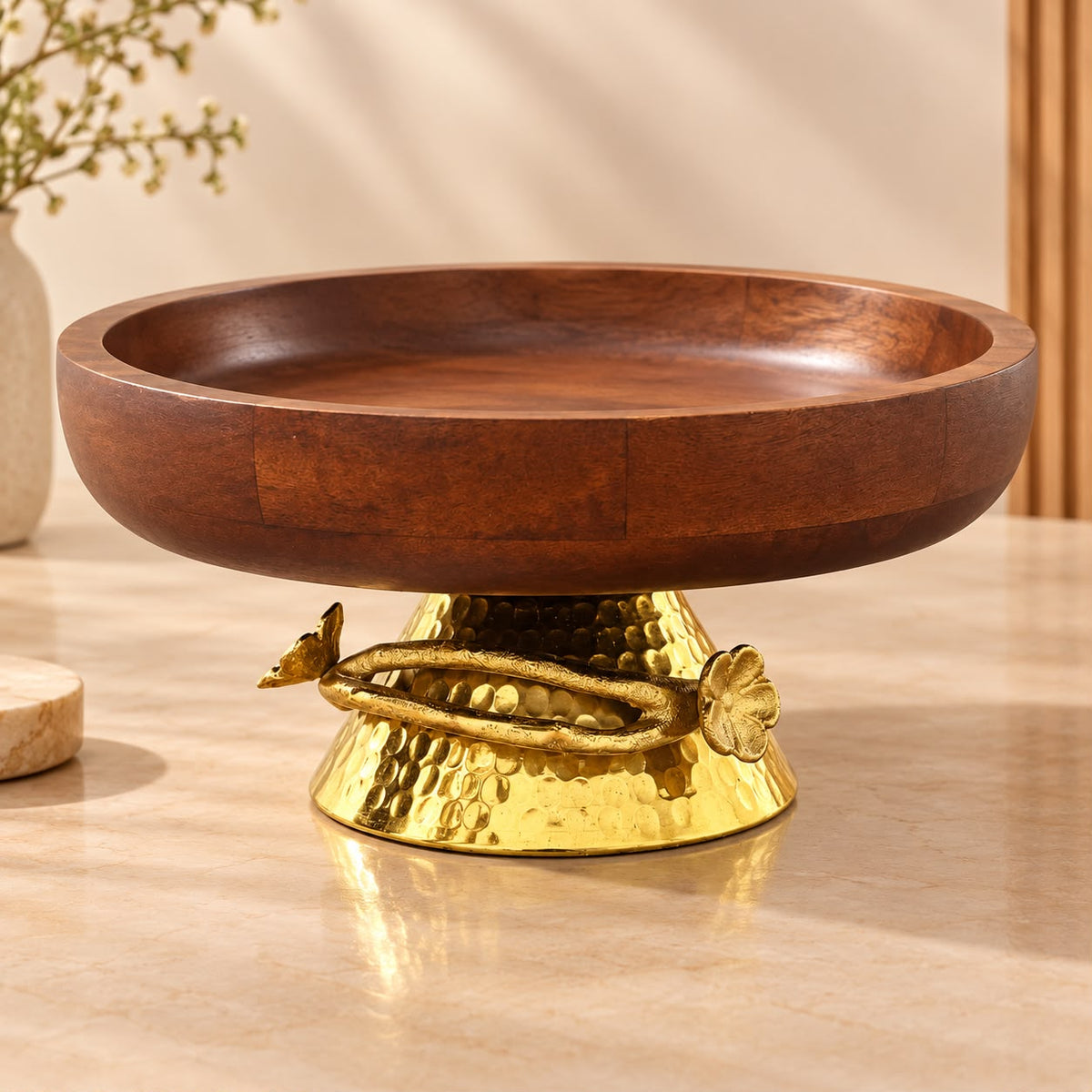 Wooden pedestal serving bowl with decorative metal stand