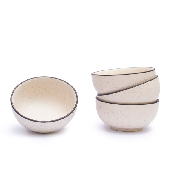 Set of colorful ceramic curry bowls for festive meals