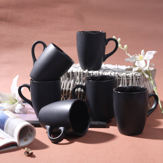 Minimalist ceramic tea mug in black glaze