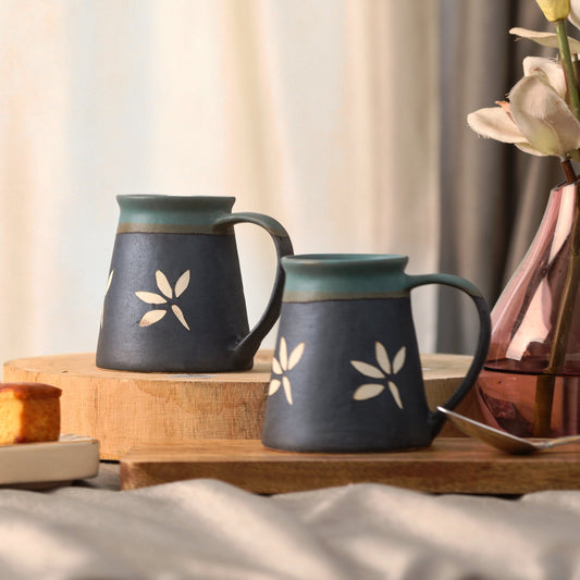 Handcrafted ceramic coffee mug with rustic glaze finish, ideal for hot beverages like coffee, tea, or latte
