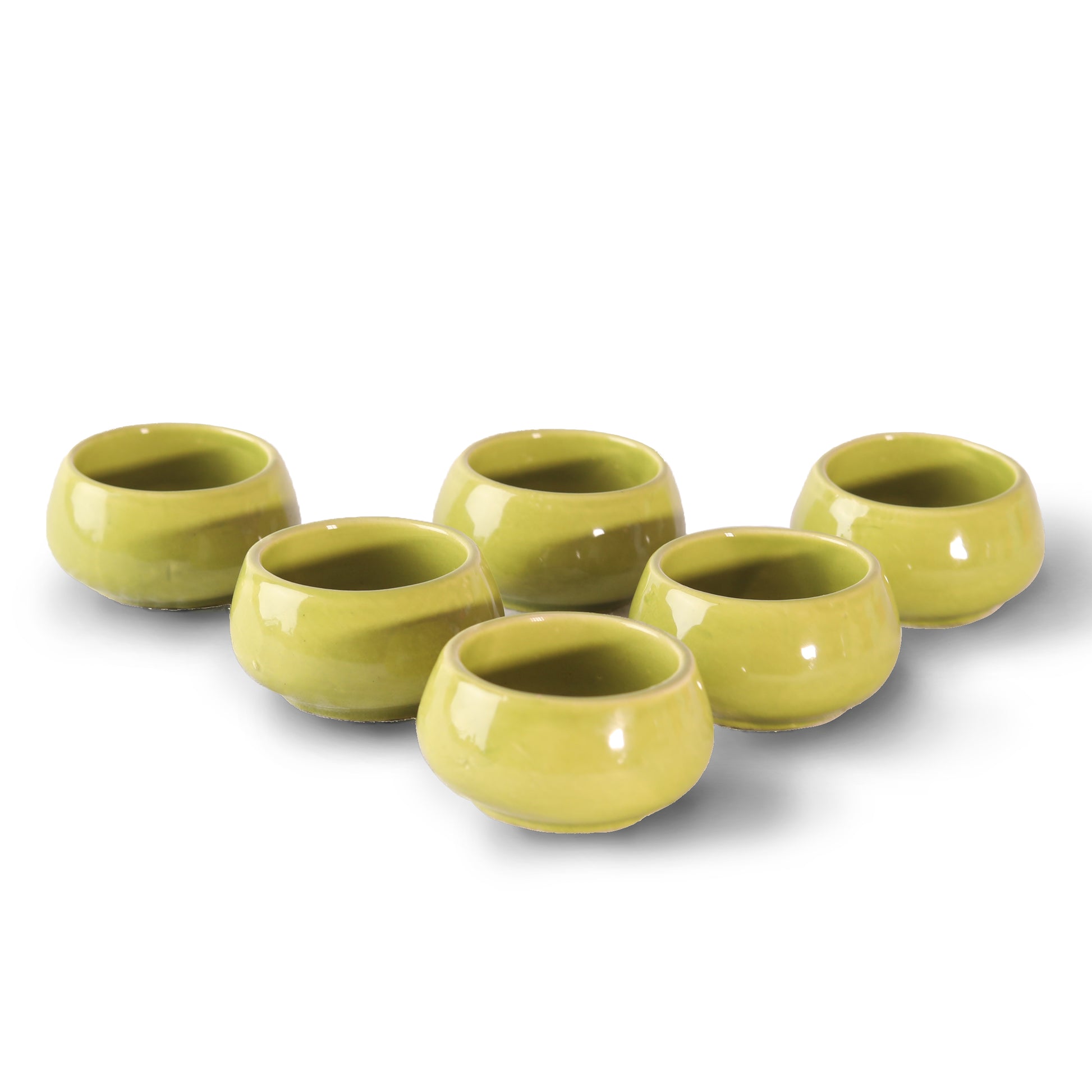 Bold ceramic bowls filled with colorful sauces